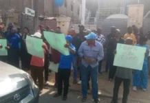 “Wike Must Go” — FCTA Worker, NLC Stage Protest at Industrial Court
