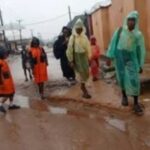 Lagos Residents Embrace Nylon Raincoats as Heavy Rains, Rising Costs Persist